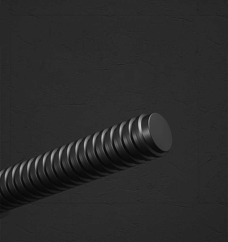 Close-up of black textured dumbbell handle for home fitness workouts