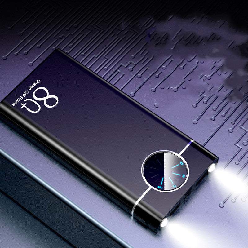 Black fast charging mobile power supply with digital display and built-in flashlight on a circuit board background