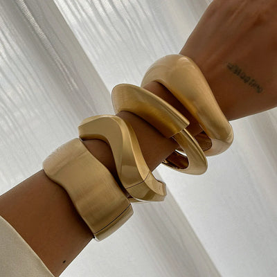 Chunky Heavy Wide Metal Water Drop Bangles.