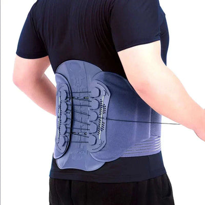 Adjustable back brace lumbar support worn on lower back by person in black shirt