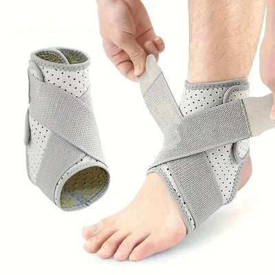 Grey ankle brace being worn and adjusted on foot for sprained ankle support