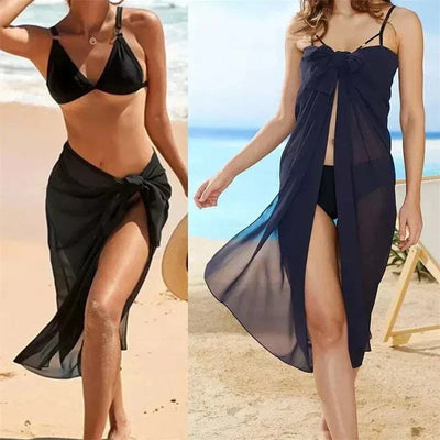 Women wearing black chiffon sexy beach skirts on sandy beach