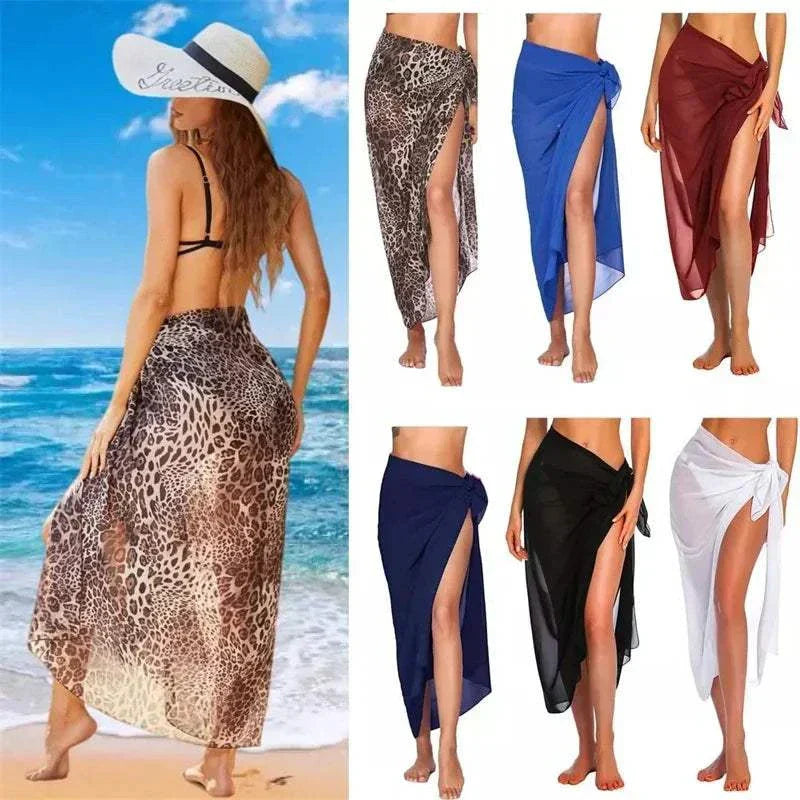 Women wearing sexy chiffon beach skirts in leopard, blue, red, navy, black, and white colors with side slits at the beach